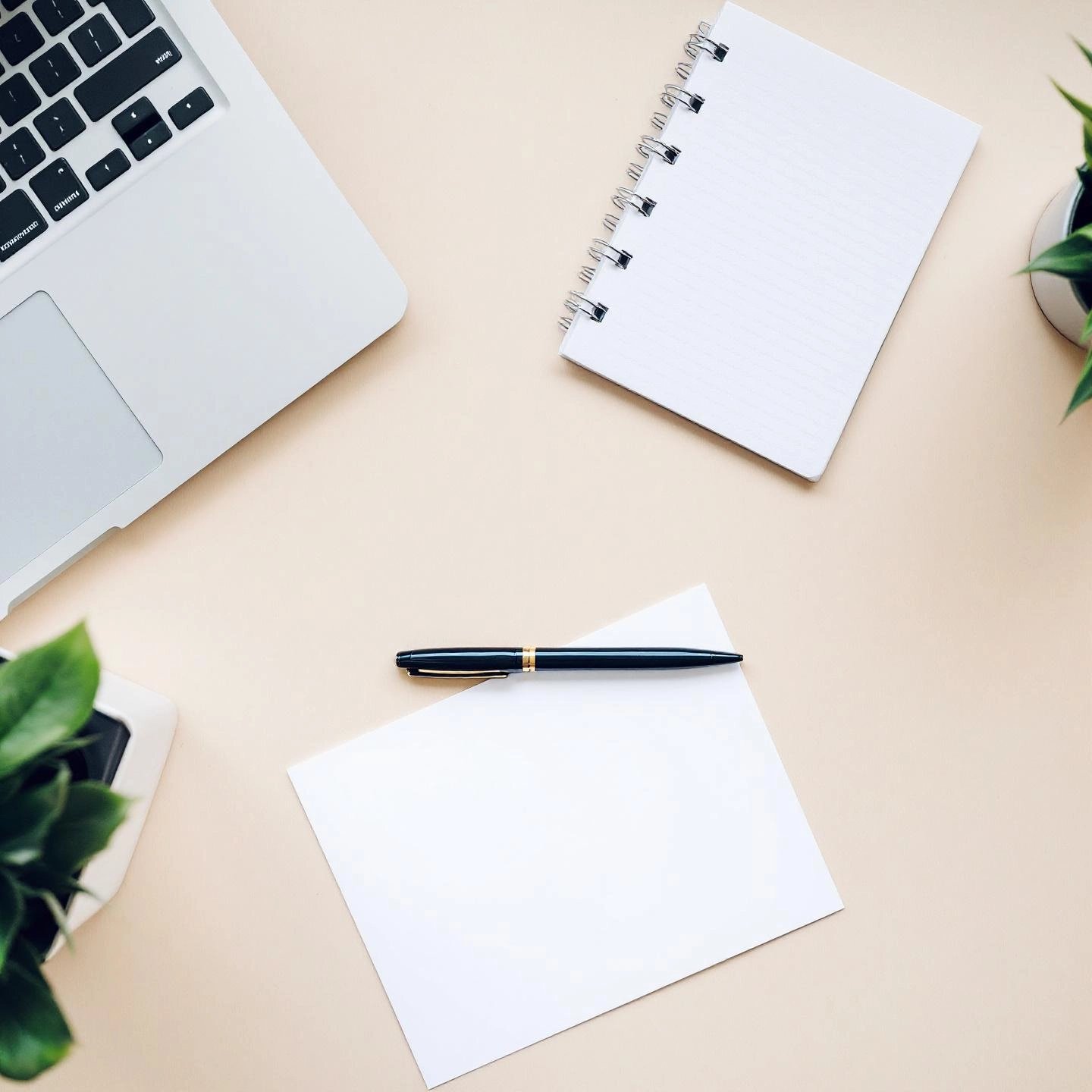 a professional workspace prepared for formal letter writing